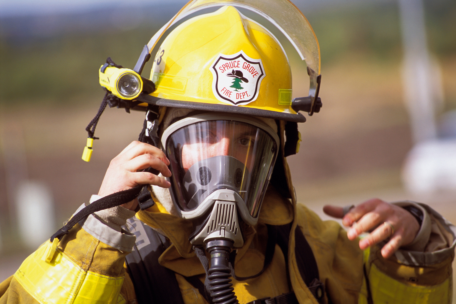 Fireman Adjusting Gas Mask